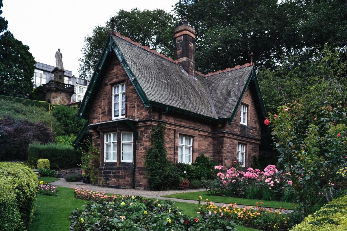 A brick cottage with lavish gardens